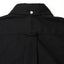 The back of the black button down tuxedo shirt, with a locker loop and a white button on the back of the collar.