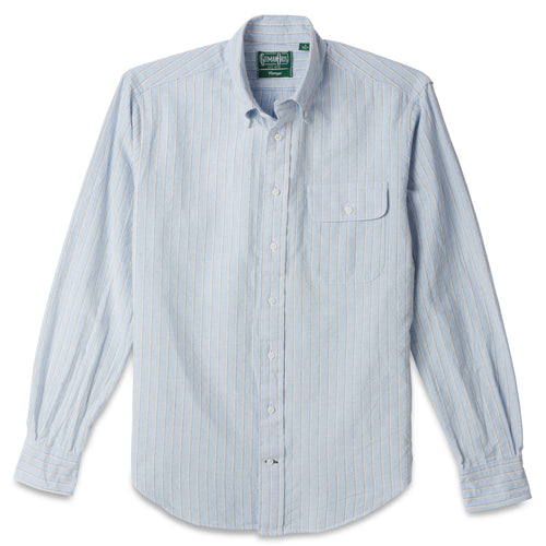 The Blue Striped Japanese Oxford shirt, with a front pocket and white buttons on a stitched placket.