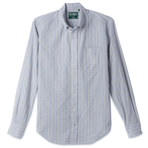 The Blue Organic Cotton Dobby Stripe button down shirt, with a front pocket and white buttons on a stitched placket.