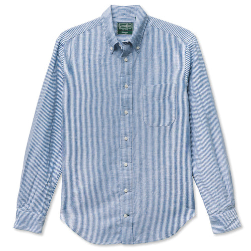 The Blue Stripe Linen shirt crafted from a breathable linen-cotton blend. Featuring a classic light blue and white stripe with refined construction, this warm-weather staple offers effortless versatility. Made in the USA.