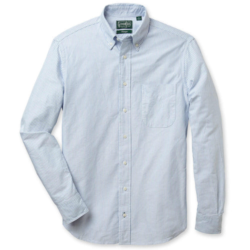 A long-sleeved blue and white striped Oxford shirt with a button-down collar and a chest pocket. made in the USA, 100% cotton, Gitman Vintage.